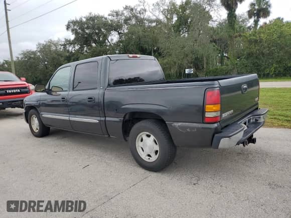 2004 GMC Sierra 1500 SLE with VIN 2GTEC13T341357367, listed as a Copart auction lot 74009444 with Not provided miles and Salvage title. Bid and sale history available at DreamBid. Image 2.