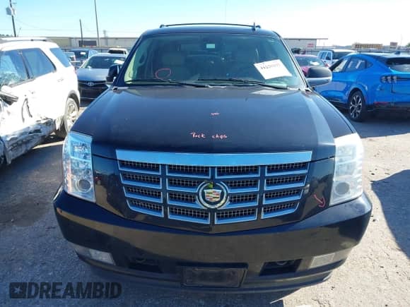 2009 Cadillac Escalade with VIN 1GYFC132X9R265628, listed as a IAAI auction lot 41230193 with 162,141 mi miles and . Bid and sale history available at DreamBid. Image 12.