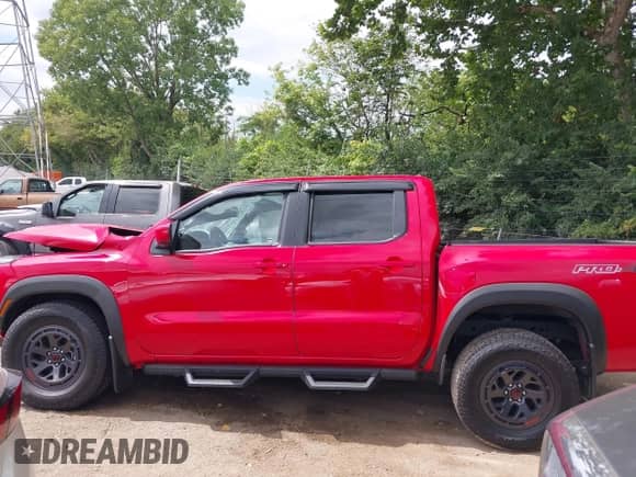2025 Nissan Frontier Pro-4X with VIN 1N6ED1EK2SN612245, listed as a IAAI auction lot 43065097 with 1,878 mi miles and . Bid and sale history available at DreamBid. Image 14.