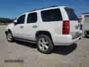 2013 Chevrolet Tahoe LT with VIN 1GNSCBE00DR216203, listed as a Copart auction lot 80108465 with 211,264 mi miles and Salvage title. Bid and sale history available at DreamBid. Image 2.
