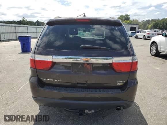 2012 Dodge Durango Crew with VIN 1C4RDHDG4CC284902, listed as a Copart auction lot 67820865 with 202,125 mi miles and Salvage title. Bid and sale history available at DreamBid. Image 6.