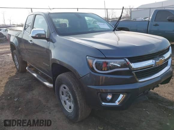 2015 Chevrolet Colorado 4WD LT z VIN 1GCHTBE36F1271625, wystawiony jako IAAI lot #41793033 z przebiegiem 46 619 mil mil oraz . Historia ofert i sprzedaży dostępna na DreamBid. Obrazek 1.