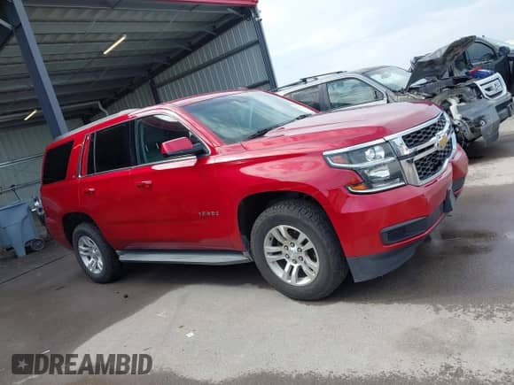 2015 Chevrolet Tahoe LT z VIN 1GNSKBKC9FR126438, wystawiony jako IAAI lot #43276273 z przebiegiem 92 503 mil mil oraz . Historia ofert i sprzedaży dostępna na DreamBid. Obrazek 13.