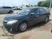 2010 Toyota Camry with VIN 4T1BB3EK1AU120023, listed as a Copart auction lot 61043335 with 185,451 mi miles and Salvage title. Bid and sale history available at DreamBid. Image 1.