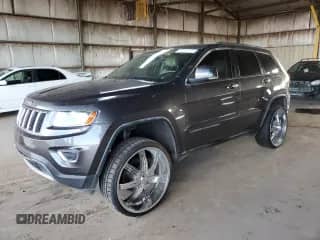 2014 Jeep Grand Cherokee Limited with VIN 1C4RJEBT3EC322470, listed as a Copart auction lot 64832105 with 148,921 mi miles and Salvage title. Bid and sale history available at DreamBid. Image 1.