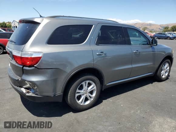 2011 Dodge Durango Express with VIN 1D4RD2GG9BC615824, listed as a Copart auction lot 66359255 with 153,575 mi miles and Salvage title. Bid and sale history available at DreamBid. Image 3.