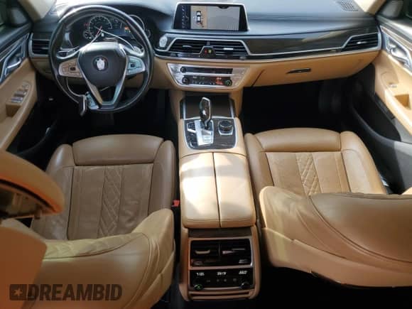 2017 BMW 7 Series 740i xDrive with VIN WBA7E4C56HGU99739, listed as a Copart auction lot 45713695 with 118,349 mi miles and Salvage title. Bid and sale history available at DreamBid. Image 8.