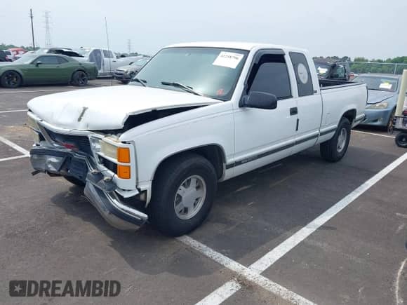 1996 GMC Sierra 1500 z VIN 2GTEC19R6T1533497, wystawiony jako IAAI lot #42258796 z przebiegiem 350 216 mil mil oraz . Historia ofert i sprzedaży dostępna na DreamBid. Obrazek 2.