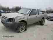 2001 Nissan Frontier SE Desert Runner with VIN 1N6ED26T81C340064, listed as a Copart auction lot 88219545 with 184,623 mi miles and Salvage title. Bid and sale history available at DreamBid. Image 1.