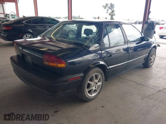 1995 Saturn SL with VIN 1G8ZG5280SZ198686, listed as a IAAI auction lot 42807601 with 294,281 mi miles and . Bid and sale history available at DreamBid. Image 4.
