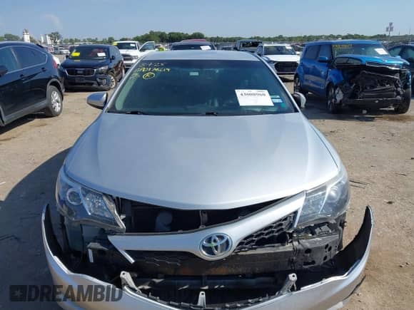 2014 Toyota Camry L with VIN 4T1BF1FK5EU373973, listed as a IAAI auction lot 43008960 with 184,232 mi miles and . Bid and sale history available at DreamBid. Image 12.