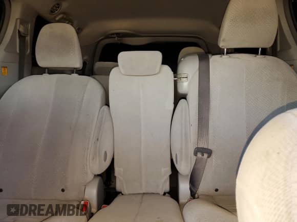 2012 Toyota Sienna z VIN 5TDKA3DC5CS009547, wystawiony jako Copart lot #70213395 z przebiegiem 197 642 mil mil oraz Szkoda całkowita • Salvage title. Historia ofert i sprzedaży dostępna na DreamBid. Obrazek 10.