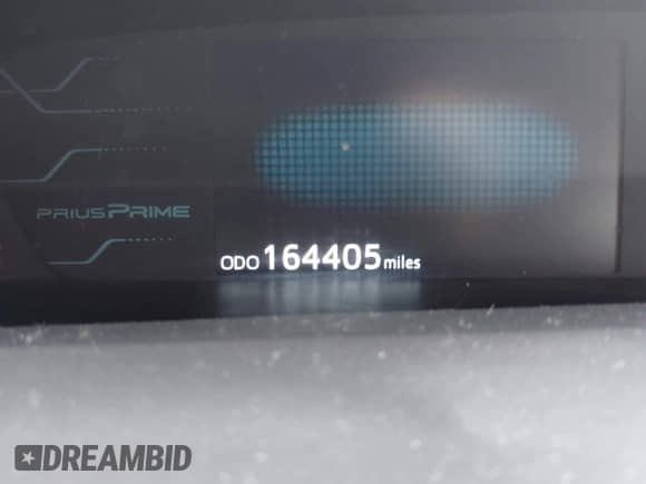 2018 Toyota Prius Plus z VIN JTDKARFP9J3098945, wystawiony jako IAAI lot #42471552 z przebiegiem 164 405 mil mil oraz . Historia ofert i sprzedaży dostępna na DreamBid. Obrazek 16.