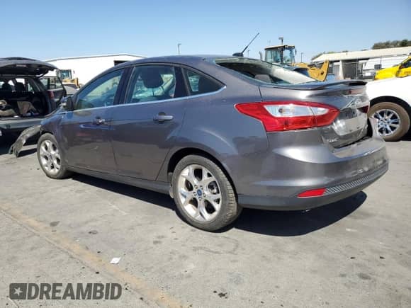 2012 Ford Focus Titanium с VIN 1FAHP3J29CL268036, выставлен на аукционе Copart как лот 70782895 с пробегом 72 791 миль миль и Списание • Salvage title. История ставок и продаж доступна на DreamBid. Изображение 2.