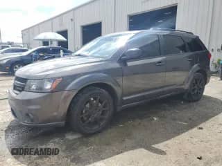 2014 Dodge Journey SXT with VIN 3C4PDCBG2ET241244, listed as a Copart auction lot 68191395 with 109,491 mi miles and Salvage title. Bid and sale history available at DreamBid. Image 1.