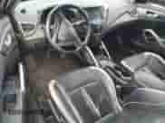 2013 Hyundai Veloster Turbo с VIN KMHTC6AE4DU171846, выставлен на аукционе Copart как лот 69561135 с пробегом Не указан миль и На запчасти • Non repairable. История ставок и продаж доступна на DreamBid. Изображение 8.