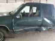 1995 GMC Sierra 1500 z VIN 2GTEC19K2S1558740, wystawiony jako Copart lot #69398185 z przebiegiem 386 899 mil mil oraz Szkoda całkowita • Salvage title. Historia ofert i sprzedaży dostępna na DreamBid. Obrazek 7.
