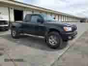 2003 Toyota Tacoma PreRunner with VIN 5TESN92N13Z209260, listed as a Copart auction lot 66989995 with 146,244 mi miles and Salvage title. Bid and sale history available at DreamBid. Image 4.