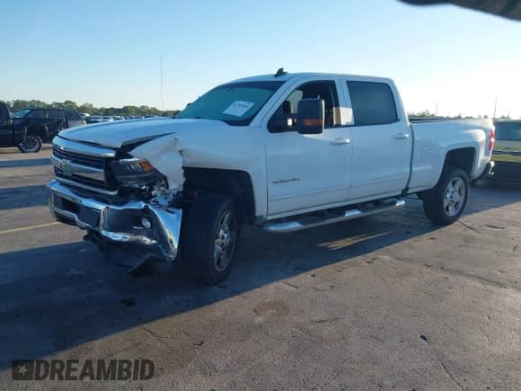 2017 Chevrolet Silverado 2500HD LT z VIN 1GC1KVEG8HF128707, wystawiony jako IAAI lot #41795885 z przebiegiem 192 048 mil mil oraz . Historia ofert i sprzedaży dostępna na DreamBid. Obrazek 2.