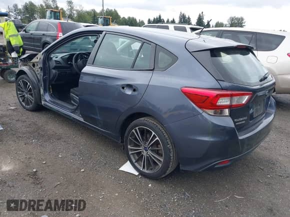 2017 Subaru Impreza with VIN 4S3GTAA60H3712937, listed as a IAAI auction lot 42921559 with 71,734 mi miles and . Bid and sale history available at DreamBid. Image 3.