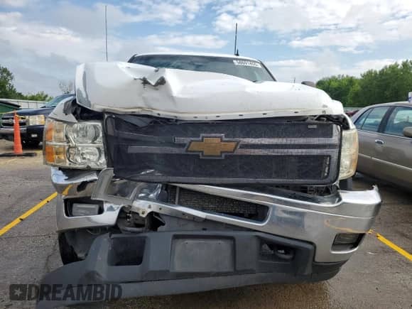 2011 Chevrolet Silverado 1500 с VIN 1GC4C1C83BF113571, выставлен на аукционе Copart как лот 58691455 с пробегом 494 553 миль миль и Списание • Salvage title. История ставок и продаж доступна на DreamBid. Изображение 5.
