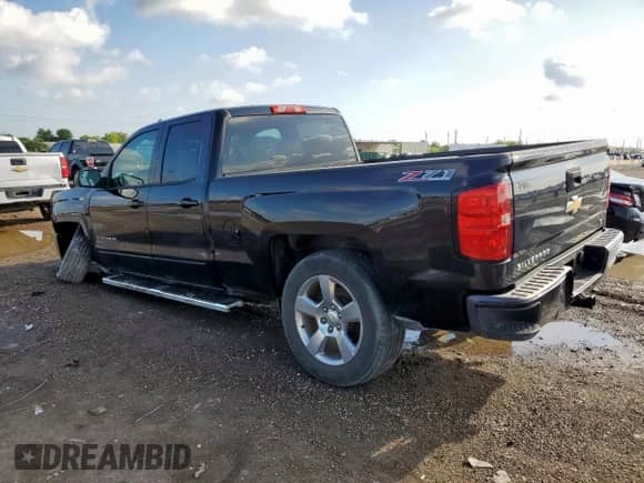 2017 Chevrolet Silverado 1500 LT with VIN 1GCVKREC4HZ401629, listed as a Copart auction lot 63997355 with 93,456 mi miles and Salvage title. Bid and sale history available at DreamBid. Image 2.