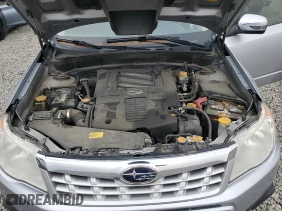 2013 Subaru Forester XT Touring z VIN JF2SHGGC7DH430966, wystawiony jako Copart lot #71505595 z przebiegiem 168 817 mil mil oraz Czysty tytuł • Clean title. Historia ofert i sprzedaży dostępna na DreamBid. Obrazek 11.