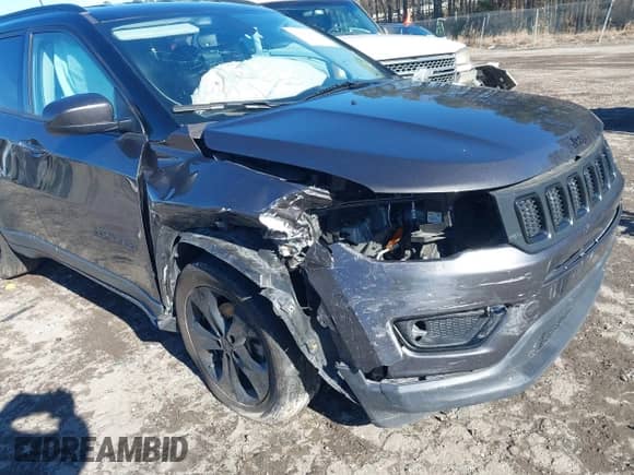 2020 Jeep Compass Latitude with VIN 3C4NJCBB8LT141103, listed as a IAAI auction lot 41263757 with 128,272 mi miles and . Bid and sale history available at DreamBid. Image 6.