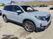 2022 Honda Passport EX-L with VIN 5FNYF7H56NB004511, listed as a Copart auction lot 66145665 with Not provided miles and Salvage title. Bid and sale history available at DreamBid. Image 4.