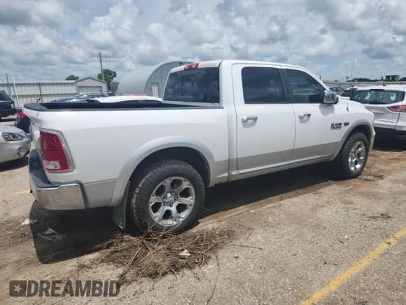 2013 Ram 1500 Laramie with VIN 1C6RR7NT0DS706959, listed as a Copart auction lot 63070965 with 168,859 mi miles and Salvage title. Bid and sale history available at DreamBid. Image 3.