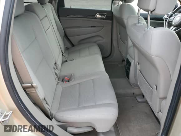 2011 Jeep Grand Cherokee 70th Anniversary with VIN 1J4RR4GGXBC563334, listed as a Copart auction lot 71876355 with 104,989 mi miles and Clean title. Bid and sale history available at DreamBid. Image 11.