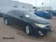 2014 Toyota Camry LE z VIN 4T1BD1FK5EU104233, wystawiony jako IAAI lot #42582088 z przebiegiem 175 975 mil mil oraz . Historia ofert i sprzedaży dostępna na DreamBid. Obrazek 1.