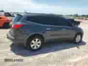 2010 Chevrolet Traverse 1LT with VIN 1GNLVFED3AS138545, listed as a Copart auction lot 61566595 with 100,988 mi miles and Salvage title. Bid and sale history available at DreamBid. Image 3.