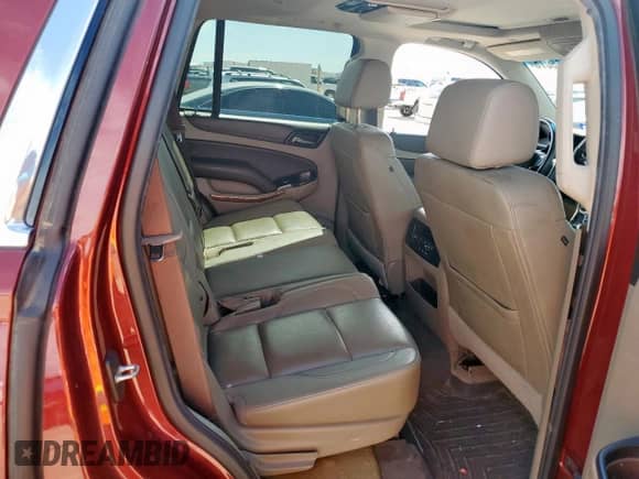 2017 Chevrolet Tahoe Premier z VIN 1GNSKCKC4HR125254, wystawiony jako Copart lot #66386075 z przebiegiem 124 090 mil mil oraz Szkoda całkowita • Salvage title. Historia ofert i sprzedaży dostępna na DreamBid. Obrazek 11.