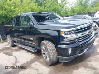 2018 Chevrolet Silverado 1500 High Country z VIN 3GCUKTEJ7JG596543, wystawiony jako IAAI lot #42413225 z przebiegiem 89 193 mil mil oraz . Historia ofert i sprzedaży dostępna na DreamBid. Obrazek 1.