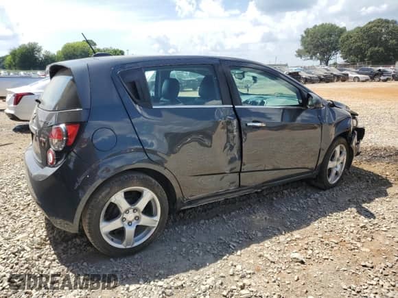 2016 Chevrolet Sonic LTZ with VIN 1G1JE6SBXG4159868, listed as a Copart auction lot 66100765 with 128,751 mi miles and Clean title. Bid and sale history available at DreamBid. Image 3.
