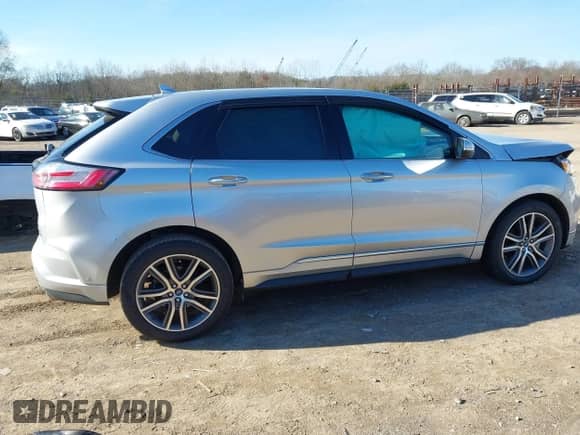 2019 Ford Edge Titanium with VIN 2FMPK3K98KBC68569, listed as a IAAI auction lot 41209347 with 75,519 mi miles and . Bid and sale history available at DreamBid. Image 13.