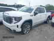 2023 GMC Sierra 1500 Denali with VIN 1GTUUGE85PZ230779, listed as a IAAI auction lot 42783346 with 38,251 mi miles and . Bid and sale history available at DreamBid. Image 2.