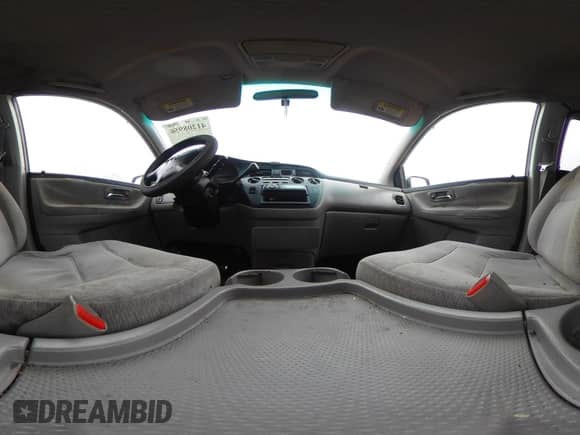 2004 Honda Odyssey LX with VIN 5FNRL18554B054258, listed as a IAAI auction lot 41208956 with 367,847 mi miles and . Bid and sale history available at DreamBid. Image 19.