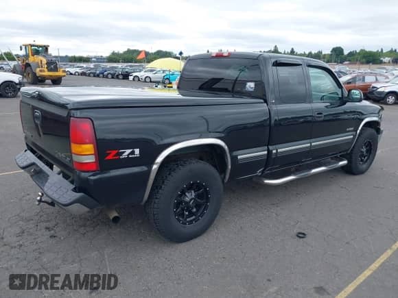 2001 Chevrolet Silverado 1500 LS with VIN 2GCEK19T911364863, listed as a IAAI auction lot 42598930 with 319,672 mi miles and . Bid and sale history available at DreamBid. Image 4.