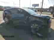 2023 Tesla Model Y Long Range with VIN 7SAYGAEE3PF903721, listed as a Copart auction lot 87489155 with Not provided miles and Salvage title. Bid and sale history available at DreamBid. Image 4.
