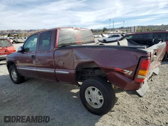 2000 GMC Sierra 1500 SLE with VIN 1GTEK19T1YE253734, listed as a Copart auction lot 42458225 with 197,956 mi miles and Salvage title. Bid and sale history available at DreamBid. Image 2.
