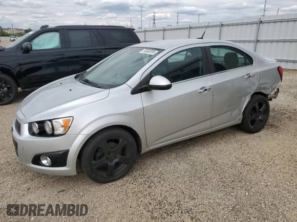 2013 Chevrolet Sonic LTZ с VIN 1G1JE5SH7D4152807, выставлен на аукционе Copart как лот 58600395 с пробегом 129 542 миль миль и Списание • Salvage title. История ставок и продаж доступна на DreamBid. Изображение 1.