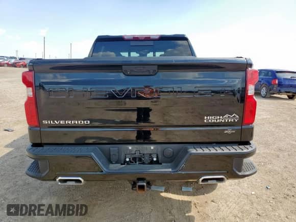 2023 Chevrolet Silverado 1500 High Country with VIN 1GCUDJE81PZ264988, listed as a Copart auction lot 63338175 with 50,477 mi miles and Salvage title. Bid and sale history available at DreamBid. Image 6.