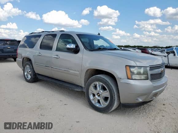 2009 Chevrolet Suburban LTZ с VIN 1GNFK36309R259949, выставлен на аукционе Copart как лот 68755135 с пробегом 85 573 миль миль и Списание • Salvage title. История ставок и продаж доступна на DreamBid. Изображение 4.
