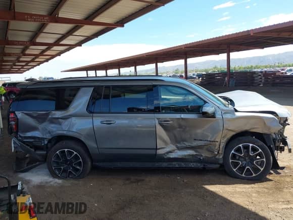 2023 Chevrolet Suburban RST с VIN 1GNSKEKD9PR132106, выставлен на аукционе IAAI как лот 43208174 с пробегом 55 647 миль миль и . История ставок и продаж доступна на DreamBid. Изображение 14.