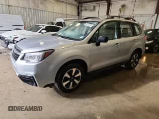 2018 Subaru Forester z VIN JF2SJABC2JH517789, wystawiony jako Copart lot #85313715 z przebiegiem Nie podano mil oraz Nie do naprawy • Non repairable. Historia ofert i sprzedaży dostępna na DreamBid. Obrazek 1.