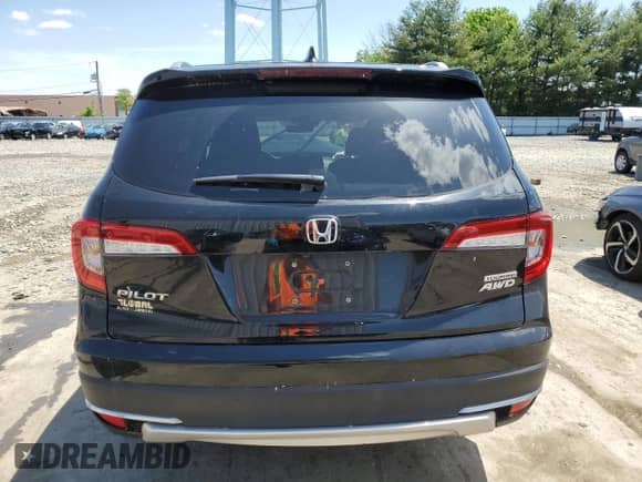 2022 Honda Pilot Touring 7-Passenger z VIN 5FNYF6H62NB057161, wystawiony jako Copart lot #56423864 z przebiegiem Nie podano mil oraz Szkoda całkowita • Salvage title. Historia ofert i sprzedaży dostępna na DreamBid. Obrazek 6.