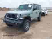 2024 Jeep Wrangler Sport S z VIN 1C4PJXDN6RW296839, wystawiony jako IAAI lot #42389476 z przebiegiem 14 069 mil mil oraz . Historia ofert i sprzedaży dostępna na DreamBid. Obrazek 2.