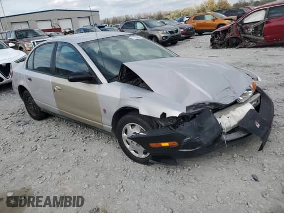 2001 Saturn SL z VIN 1G8ZH52891Z209342, wystawiony jako Copart lot #77155874 z przebiegiem Nie podano mil oraz Szkoda całkowita • Salvage title. Historia ofert i sprzedaży dostępna na DreamBid. Obrazek 4.